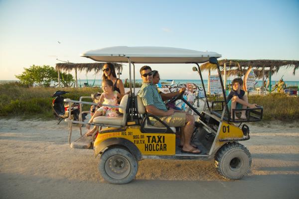 Family on Golf Cart Taxi