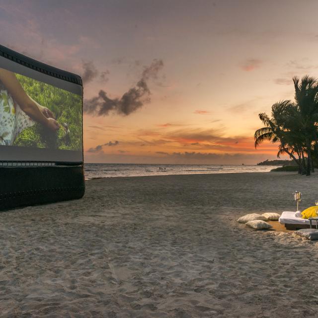 Projector and Chairs on Beach
