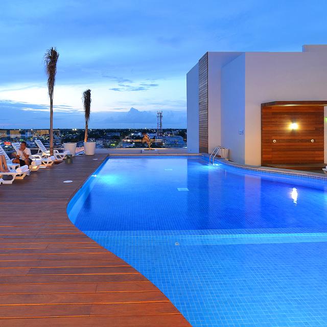 Rooftop Pool and Deck at Sunset