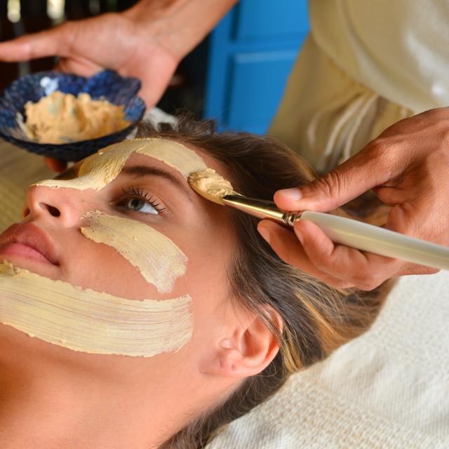Woman Getting Facial Treatment at Spa