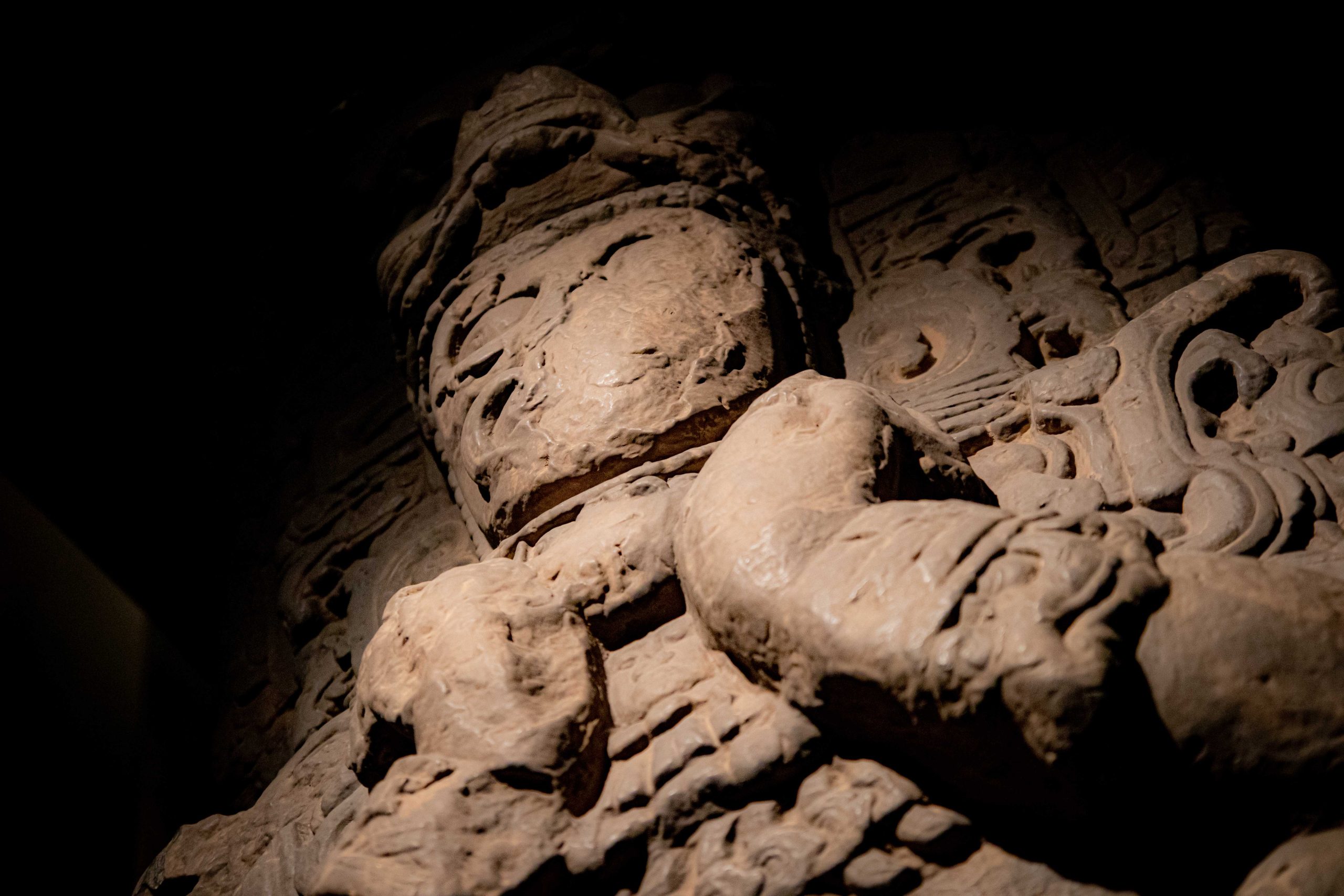 Lit Maya stucco mask in the museum